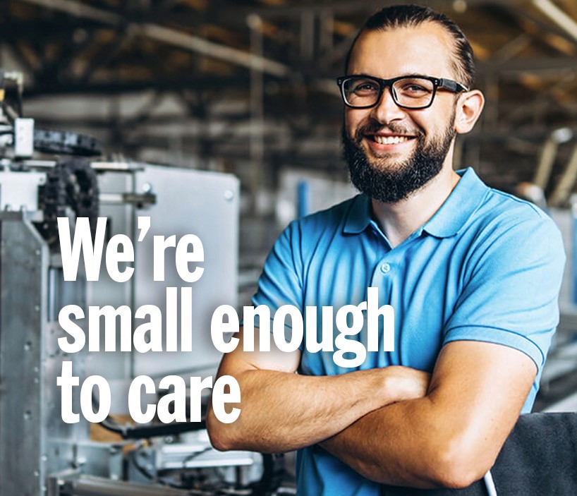 Engineer Smiling While Crossing Arms With Bold Text 